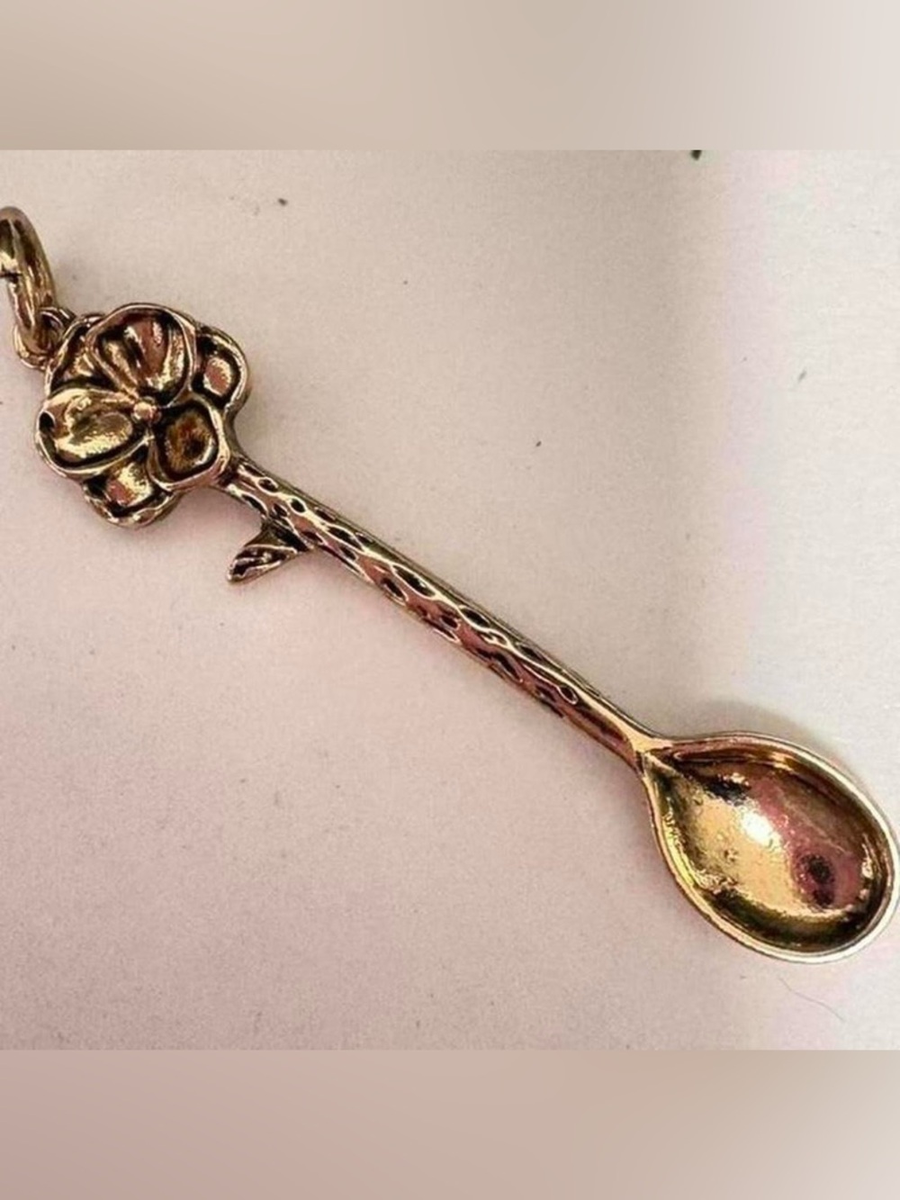 Floral Handle Decorative Spoon pendant in Shiny Gold Tone